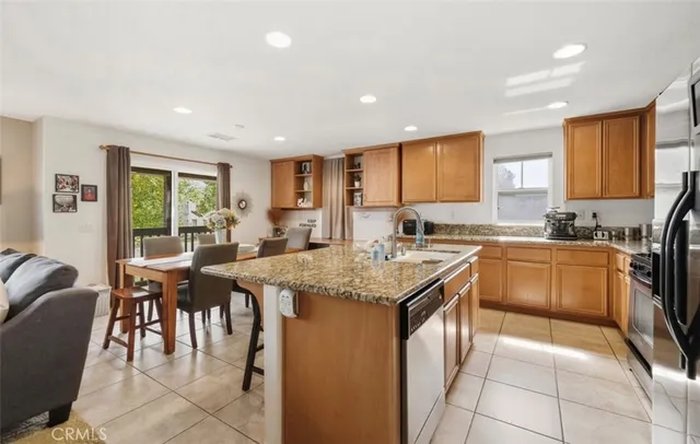 a kitchen with lots of counter top space and appliances