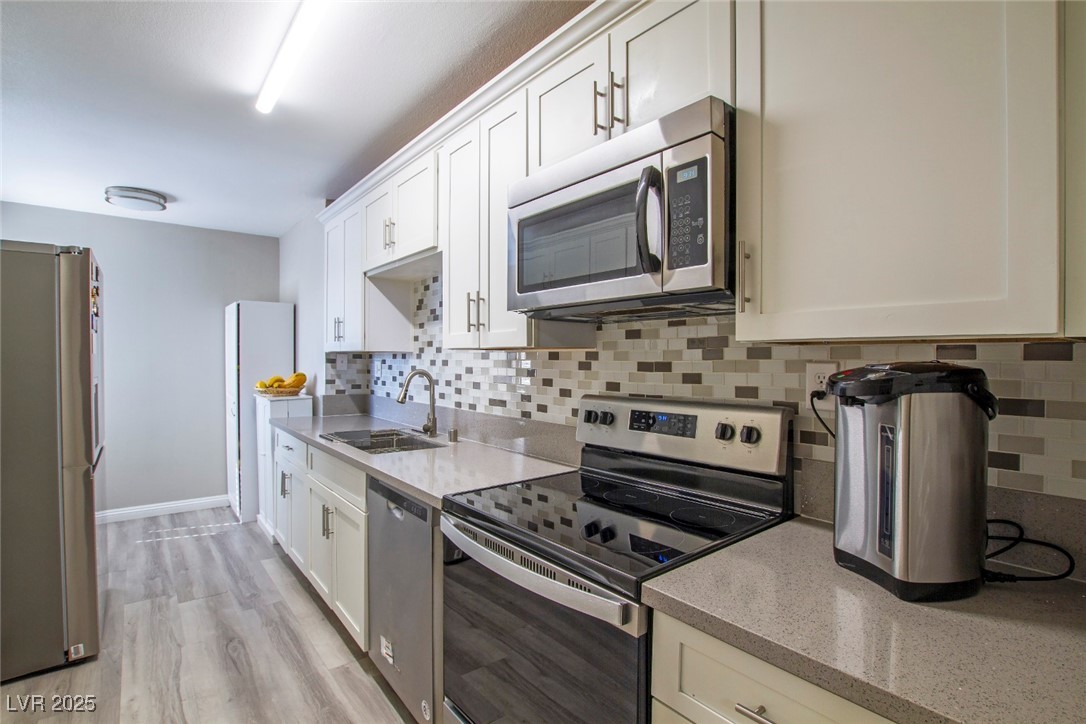 730 South Royal Crest Circle, Unit 421 Las Vegas, NV 89169 - Photo 7 of 21 Kitchen featuring appliances with stainless steel