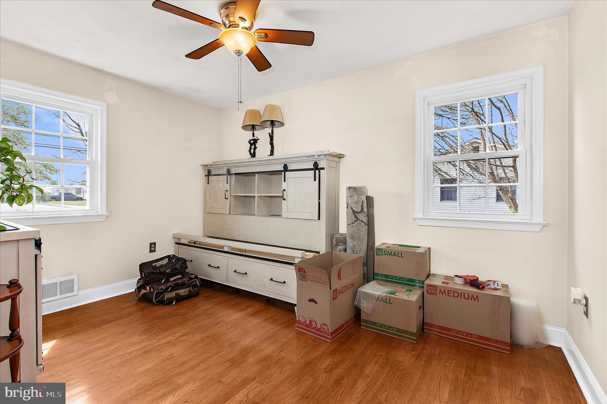 9140 Vollmerhausen Road Savage, MD 20794 - Photo 19 of 49 a room with furniture and wooden floor