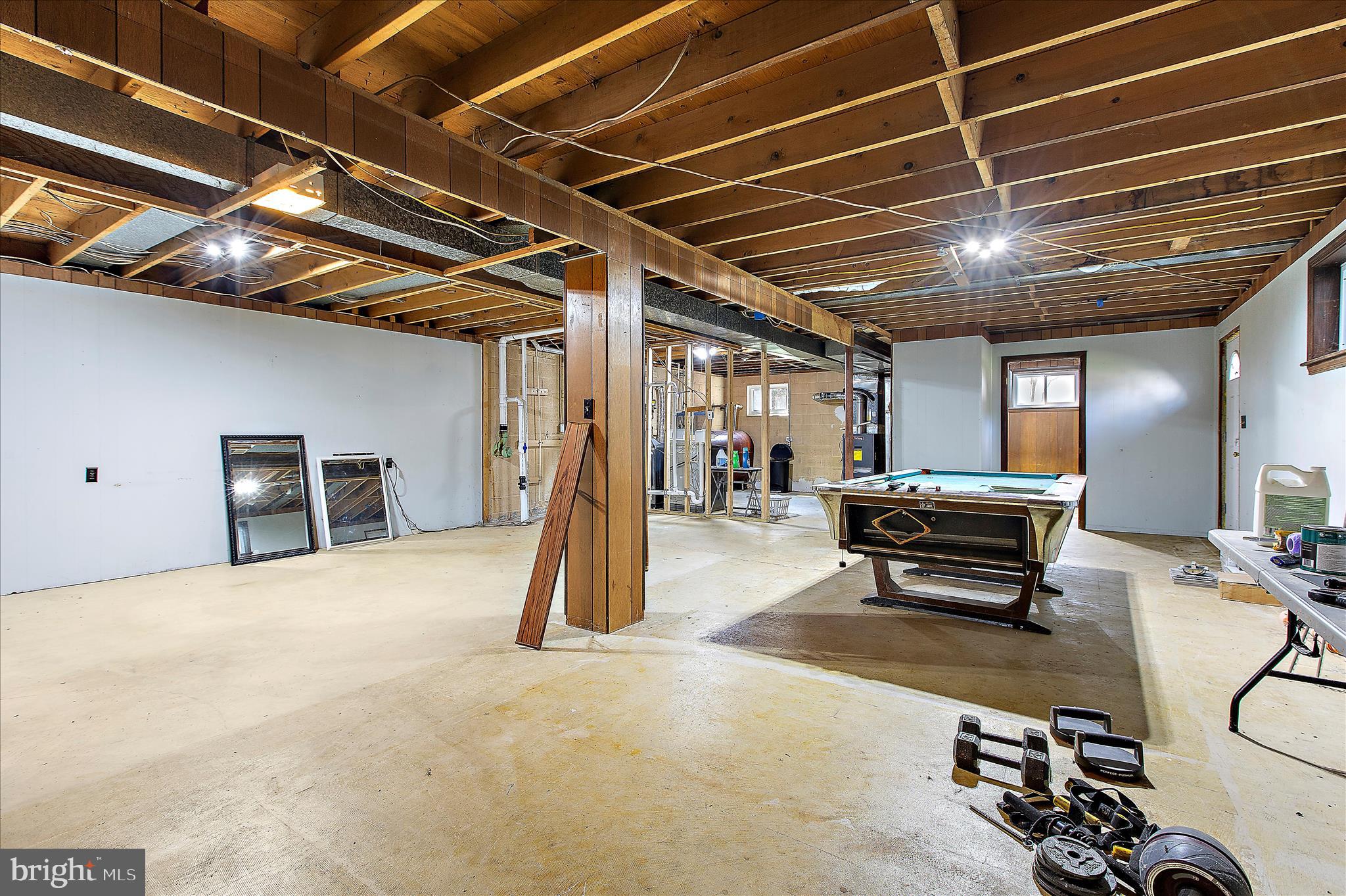 9140 Vollmerhausen Road Savage, MD 20794 - Photo 26 of 49 a view of a room with gym equipment