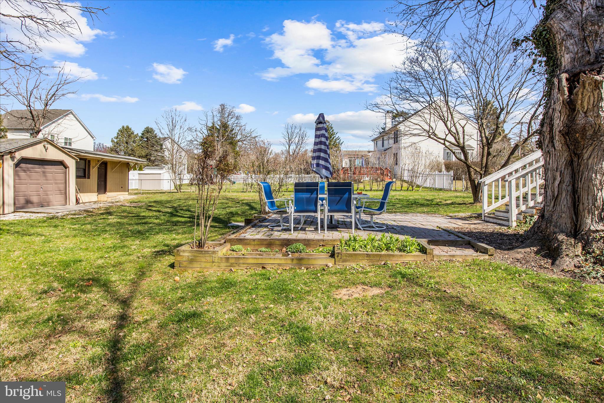 9140 Vollmerhausen Road Savage, MD 20794 - Photo 47 of 49 a view of a house with a big yard and large trees