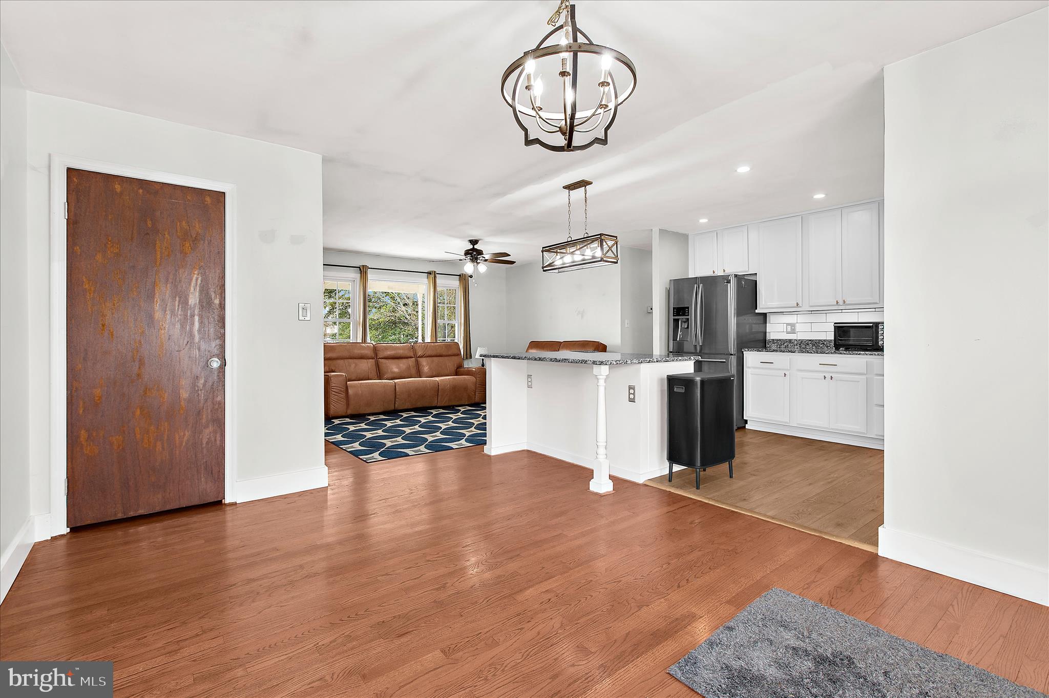9140 Vollmerhausen Road Savage, MD 20794 - Photo 8 of 49 a open kitchen with cabinets and stainless steel appliances
