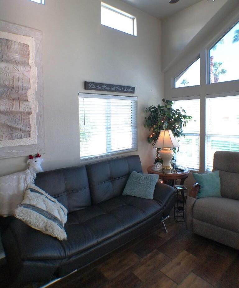 84136 Ave 44, Unit 125 Indio, CA 92203 - Photo 23 of 71 a living room with furniture and a large window