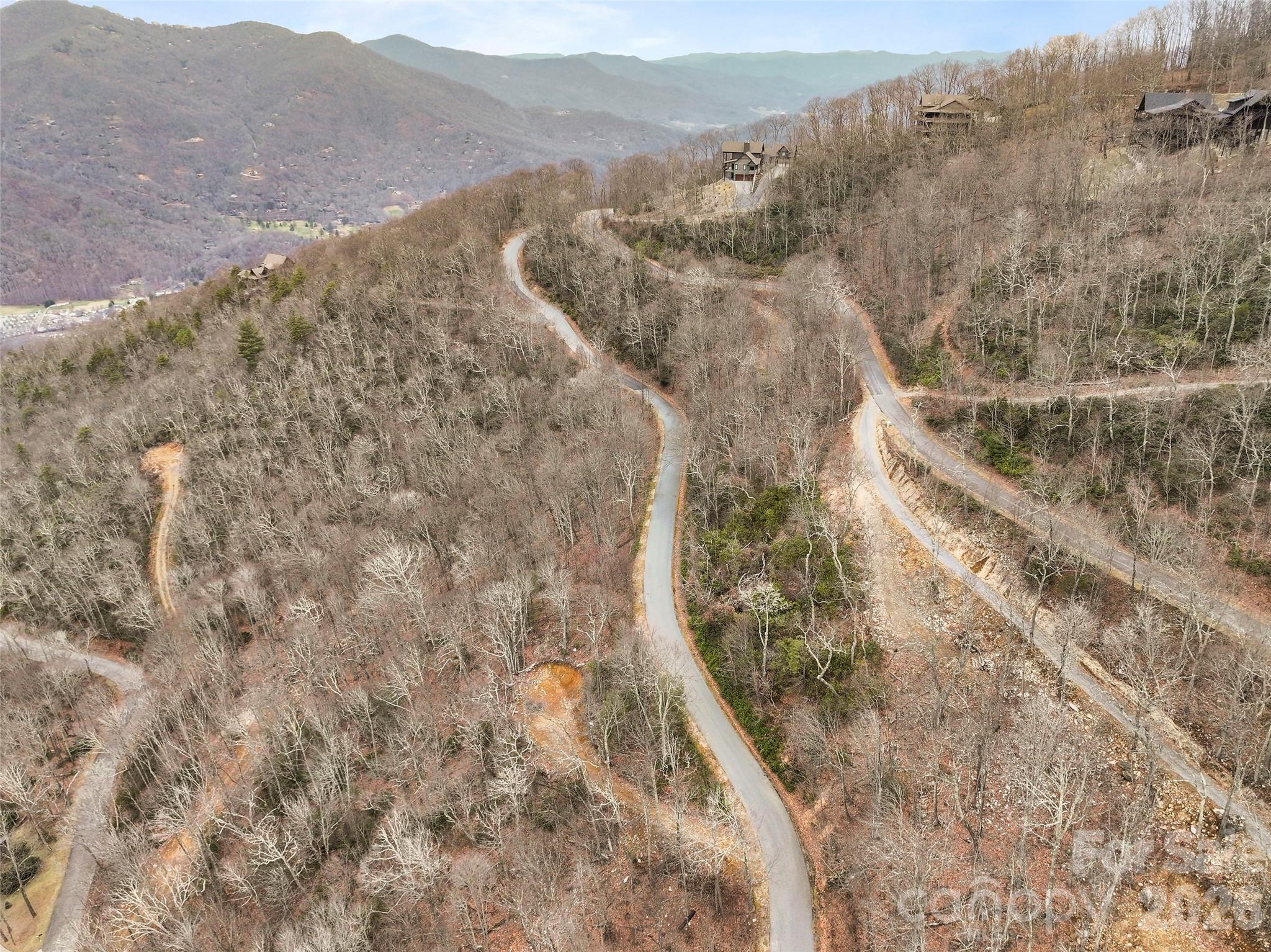1480 Odalu Trail Apex, NC 27523 - Photo 21 of 32 a view of a dry yard with mountains in the background