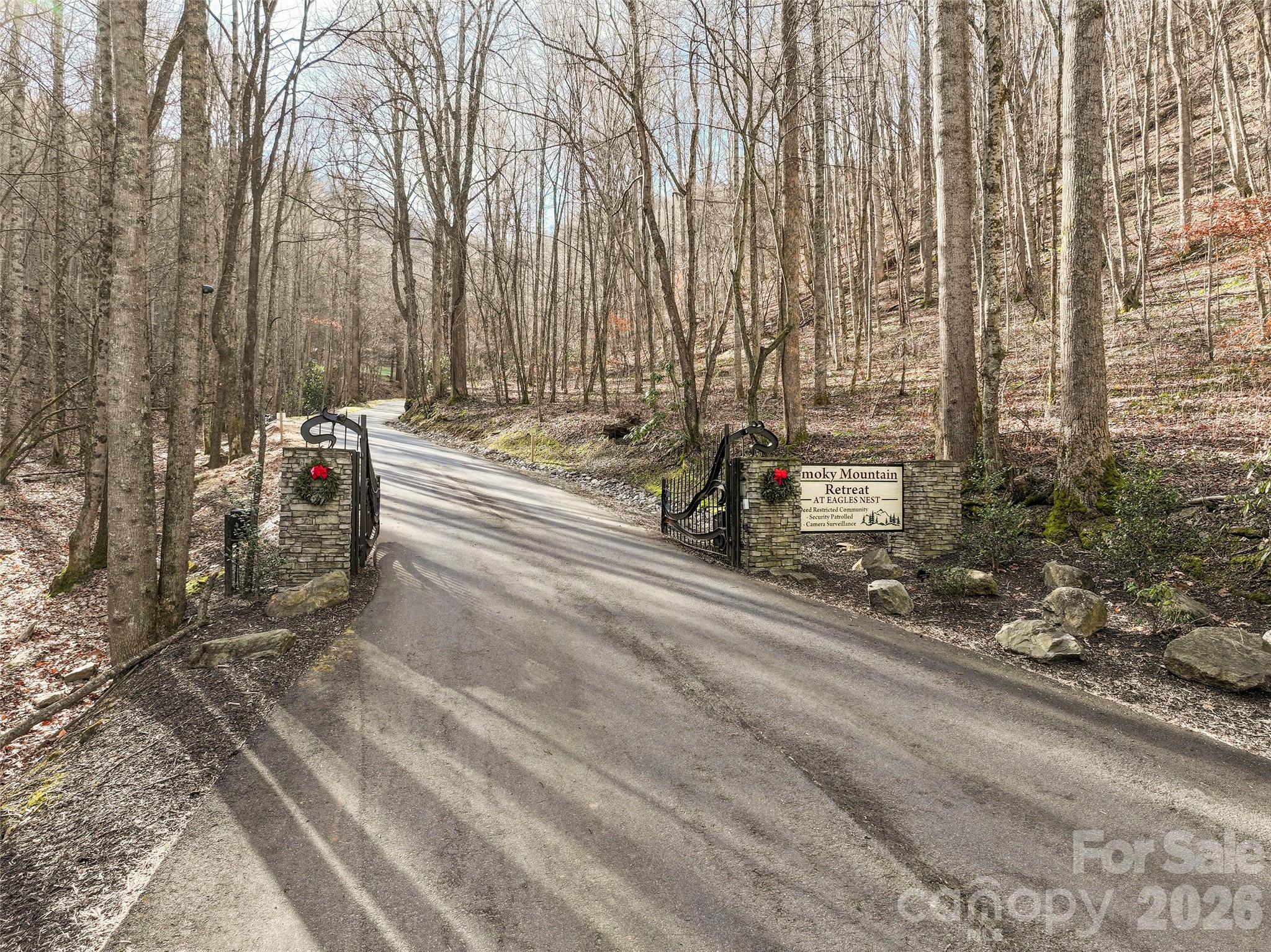 1480 Odalu Trail Apex, NC 27523 - Photo 26 of 32 a view of a street with a bench and trees