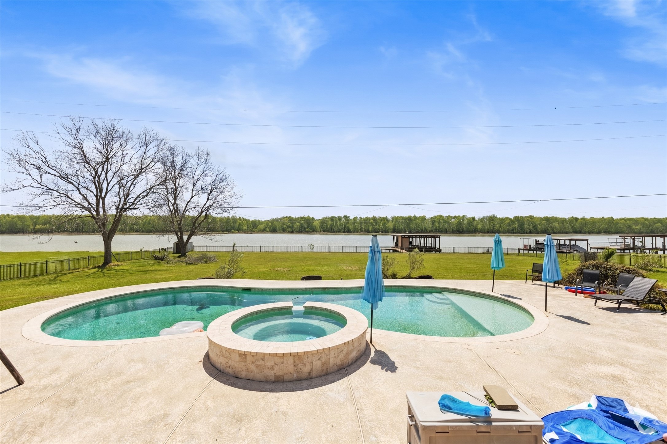 174 Lake Front Drive Trinity, TX 75862 - Photo 33 of 44 a view of a swimming pool and an outdoor seating