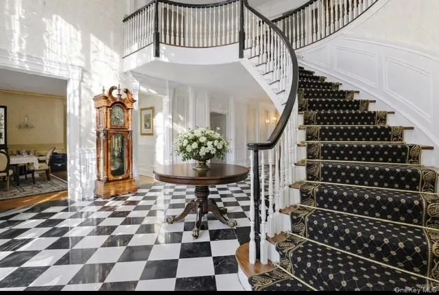 a view of entryway with a front door