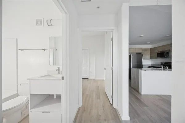 a view of a bathroom from the hallway