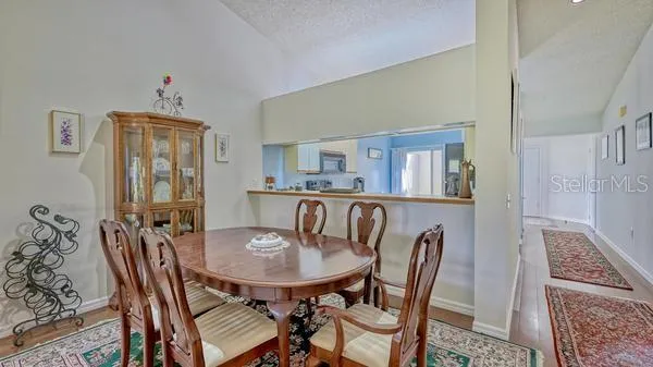 a view of a dining room with furniture
