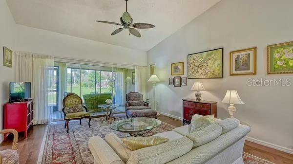 a living room with furniture and a window
