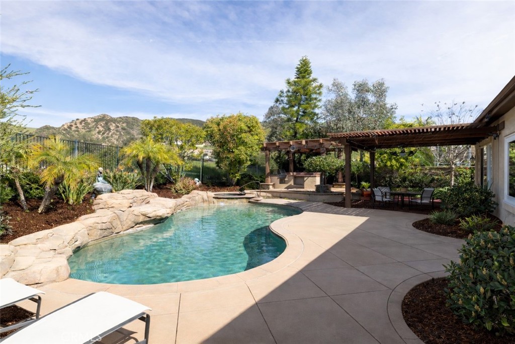 29031 Bouquet Canyon Road Silverado, CA 92676 - Photo 1 of 26 a view of a swimming pool with a patio
