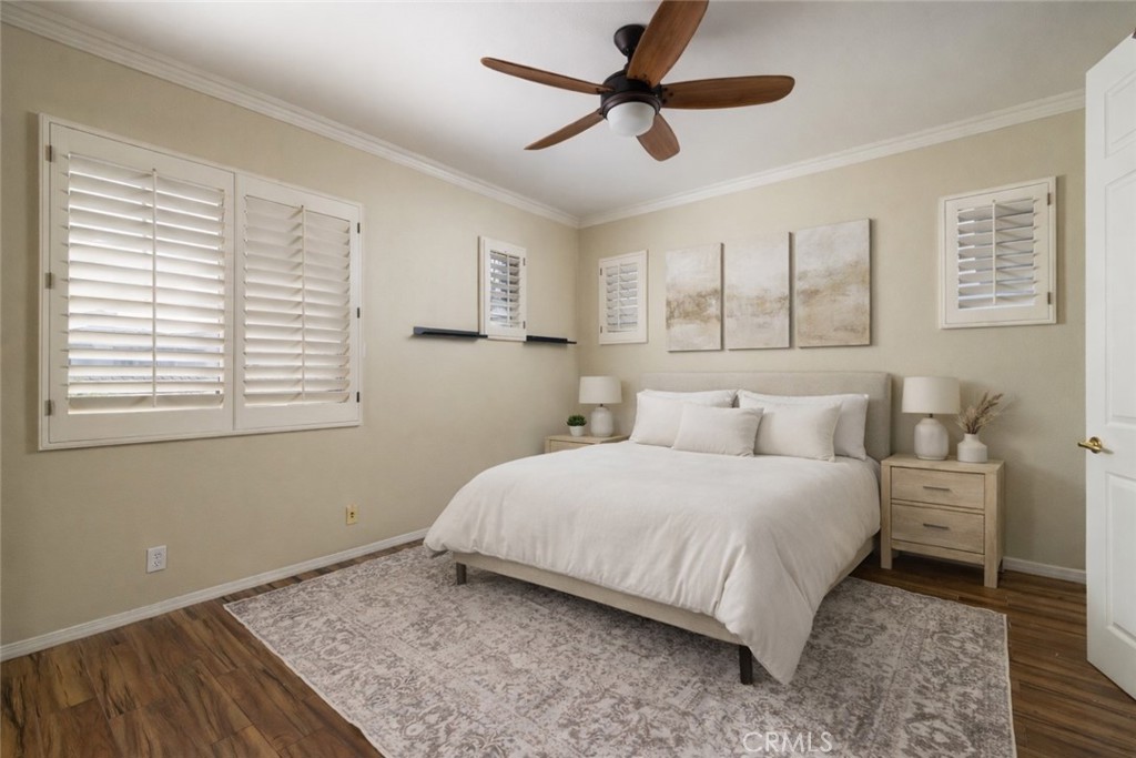29031 Bouquet Canyon Road Silverado, CA 92676 - Photo 11 of 26 a bedroom with a large bed and a window