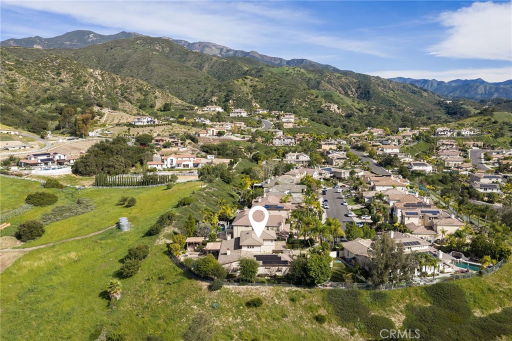 29031 Bouquet Canyon Road Silverado, CA 92676 - Photo 16 of 26 a view of a city with mountains in the background
