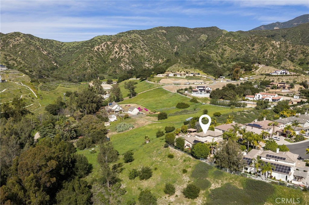 29031 Bouquet Canyon Road Silverado, CA 92676 - Photo 20 of 26 a view of a city with mountains in the background