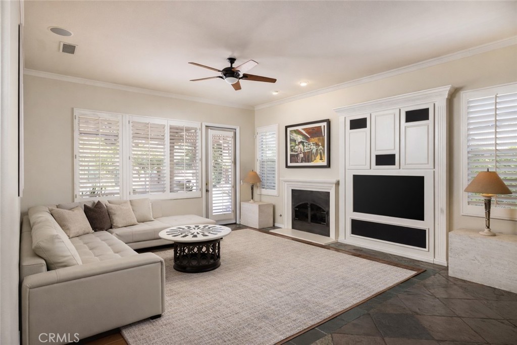 29031 Bouquet Canyon Road Silverado, CA 92676 - Photo 5 of 26 a living room with furniture flat screen tv and a fireplace