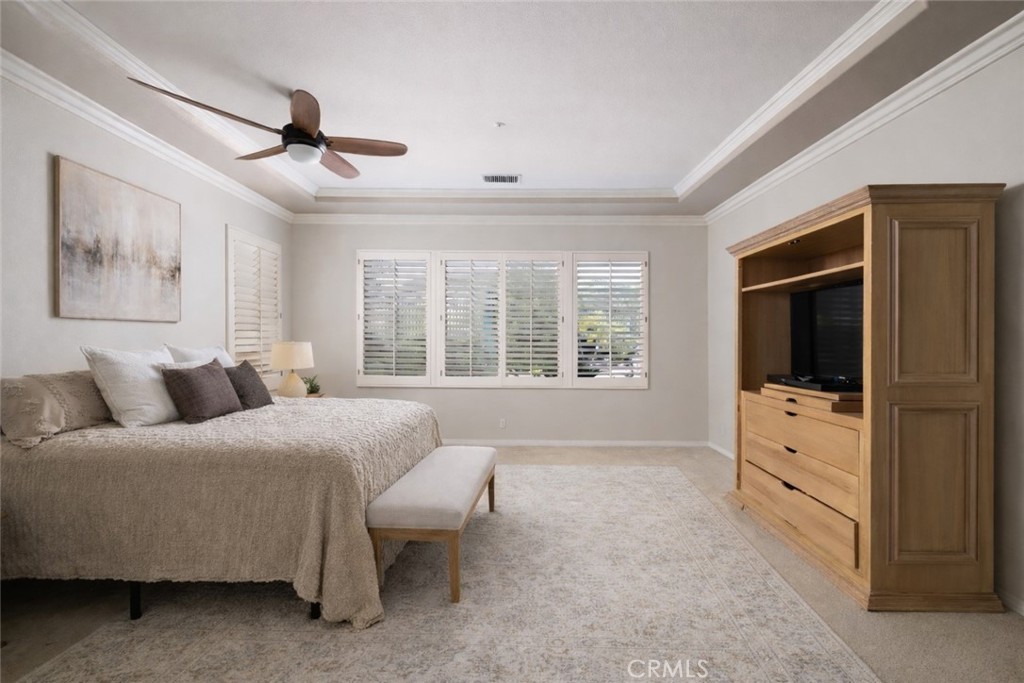 29031 Bouquet Canyon Road Silverado, CA 92676 - Photo 7 of 26 a bedroom with a bed and a flat screen tv