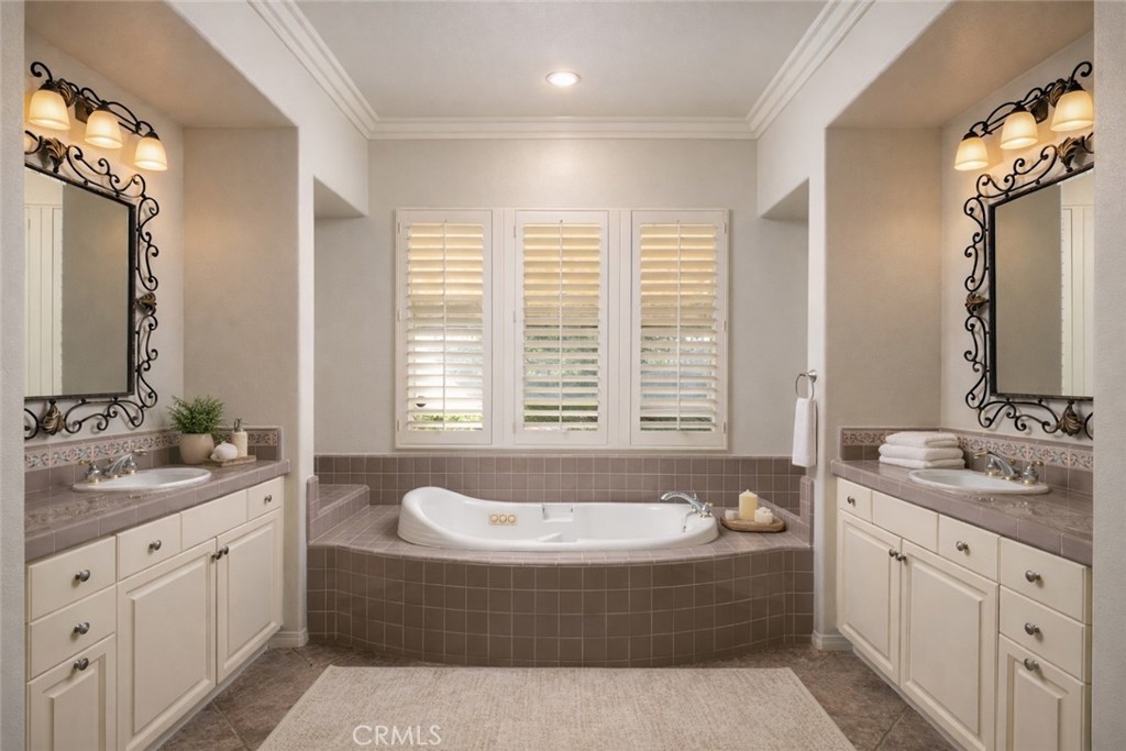 29031 Bouquet Canyon Road Silverado, CA 92676 - Photo 9 of 26 a bathroom with a tub sink and mirror