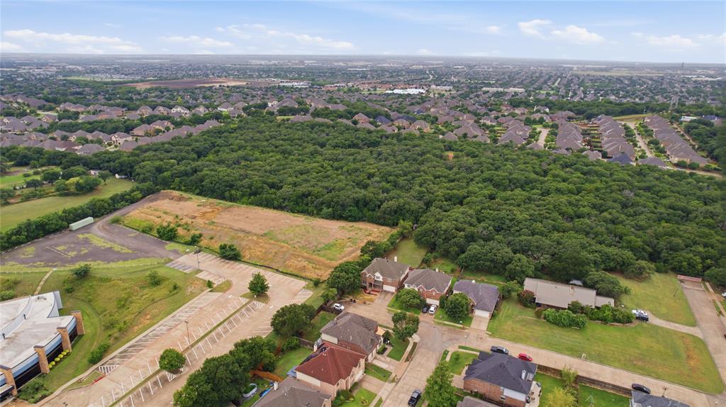 10001 Thurman Road Fort Worth, TX 76244 - Photo 39 of 40 Expansive tree canopy provides a natural backdrop for this residential area