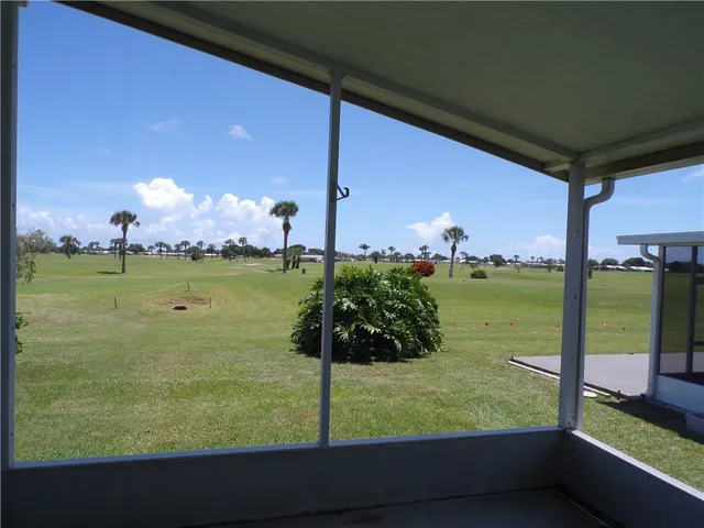 a view of a lake from a balcony