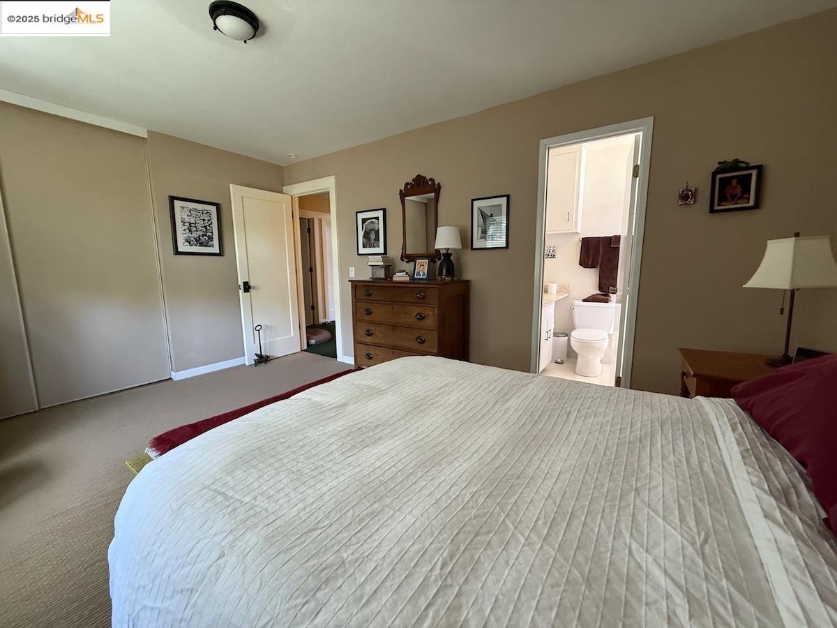 Domingo Avenue Berkeley, CA 94705 - Photo 26 of 43 a bedroom with a bed and a dresser