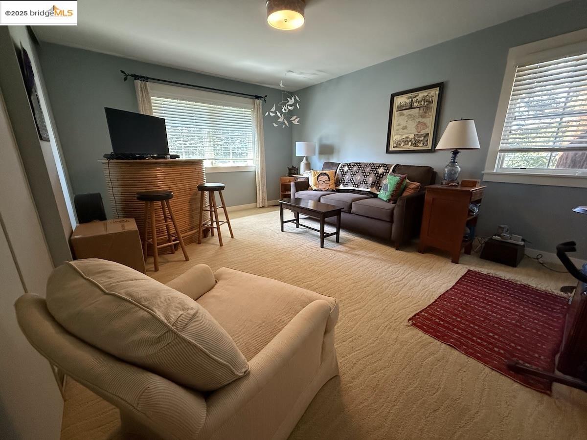 Domingo Avenue Berkeley, CA 94705 - Photo 31 of 43 a living room with furniture and a flat screen tv