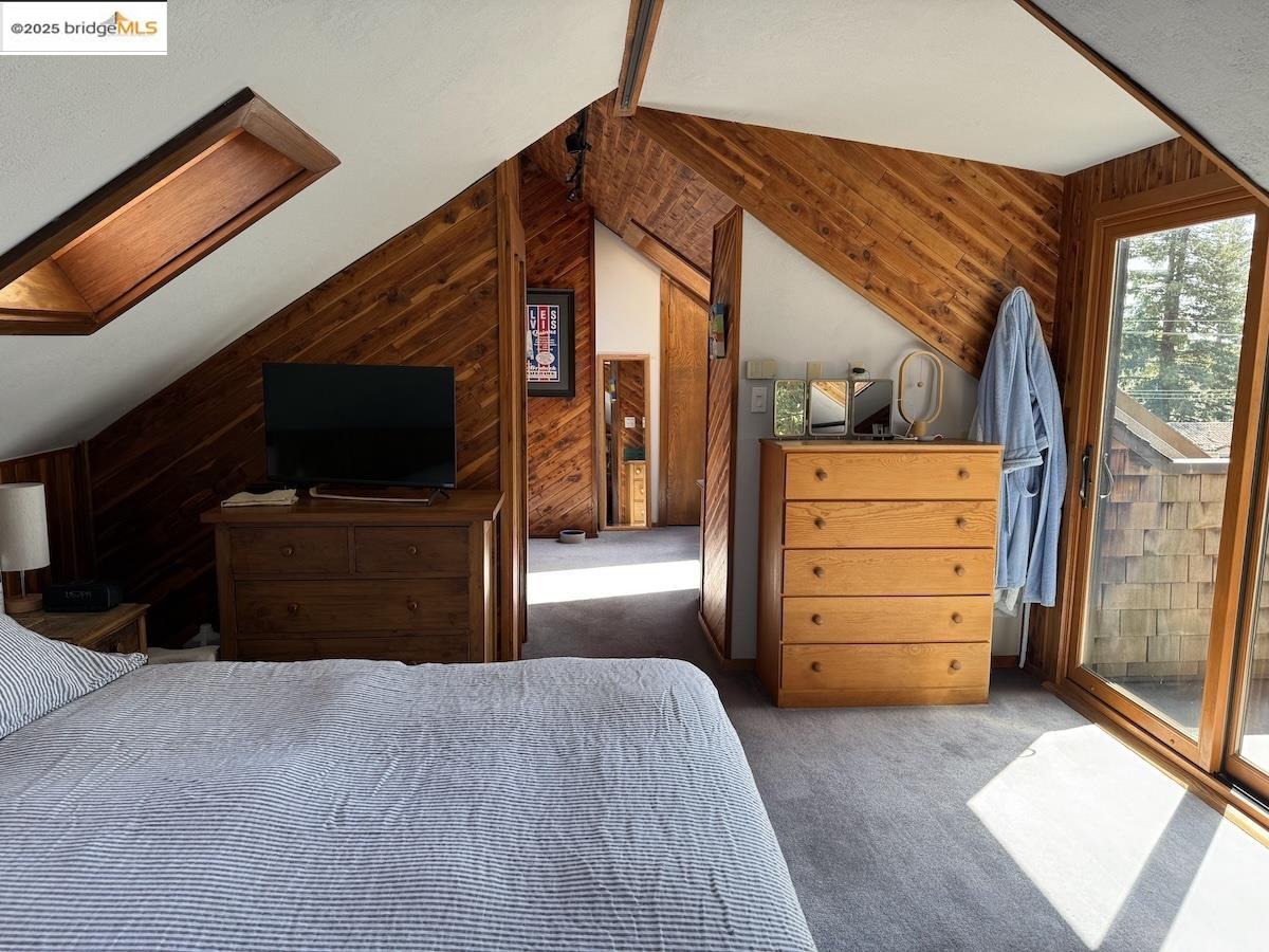 Domingo Avenue Berkeley, CA 94705 - Photo 41 of 43 a bedroom with a bed and a television