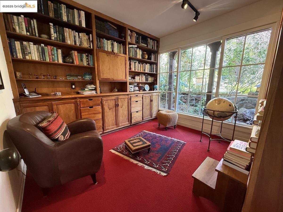 Domingo Avenue Berkeley, CA 94705 - Photo 6 of 43 a living room with furniture a rug and a large window