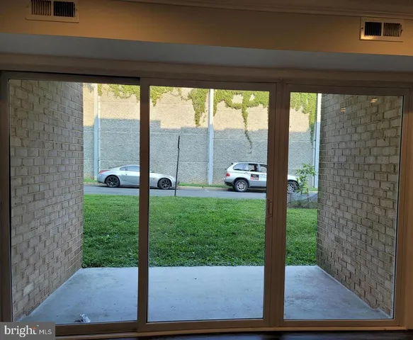 a view of a porch with a garden
