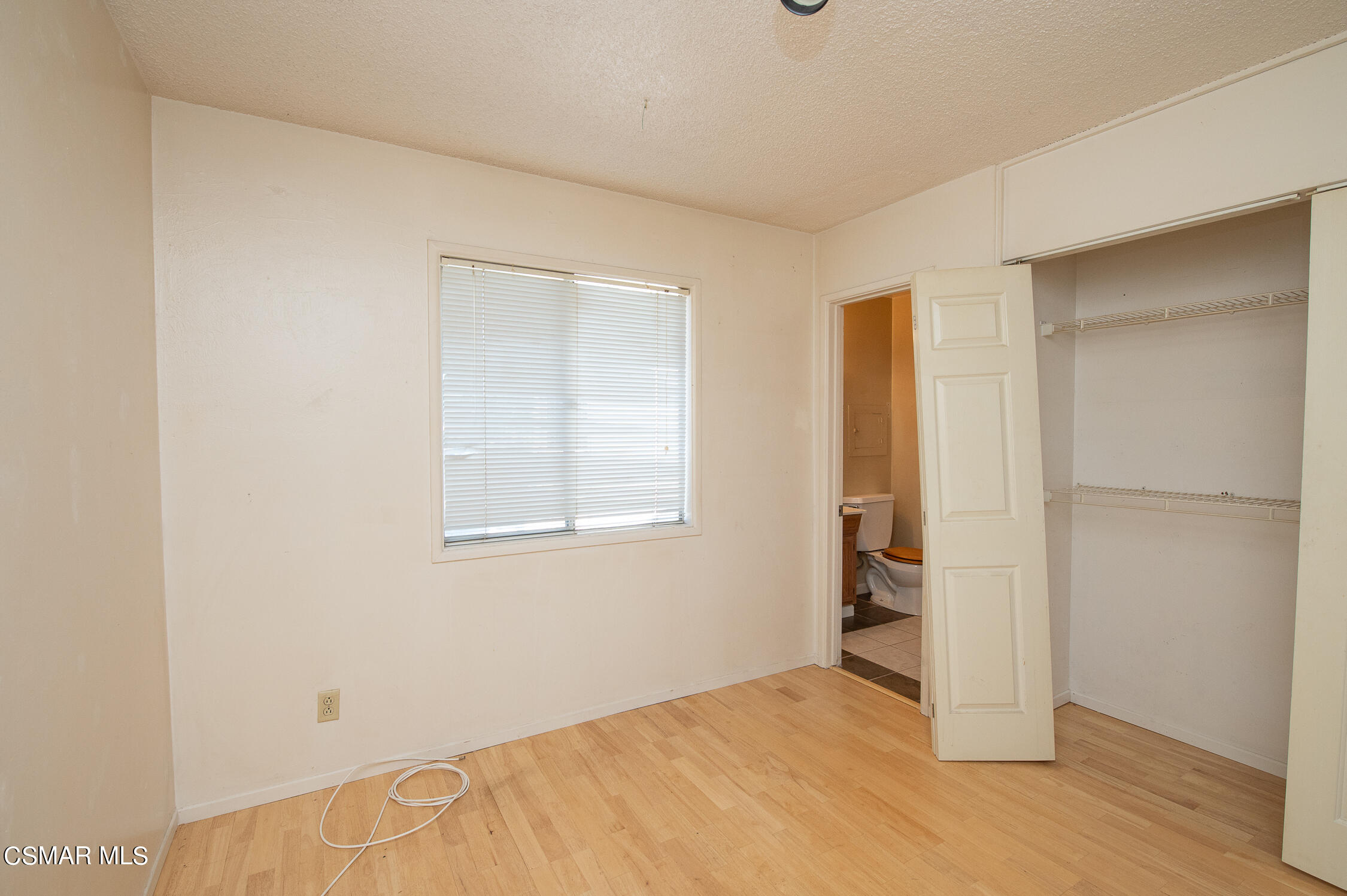 492 Graham Avenue Camarillo, CA 93010 - Photo 15 of 33 an empty room with windows and closet