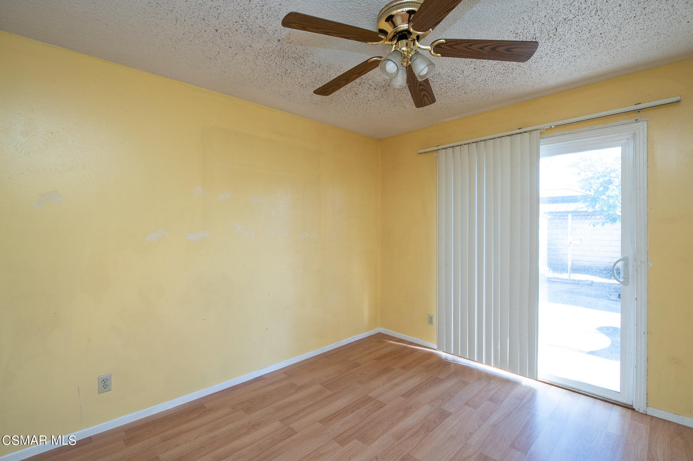 492 Graham Avenue Camarillo, CA 93010 - Photo 21 of 33 an empty room with wooden floor fan and windows