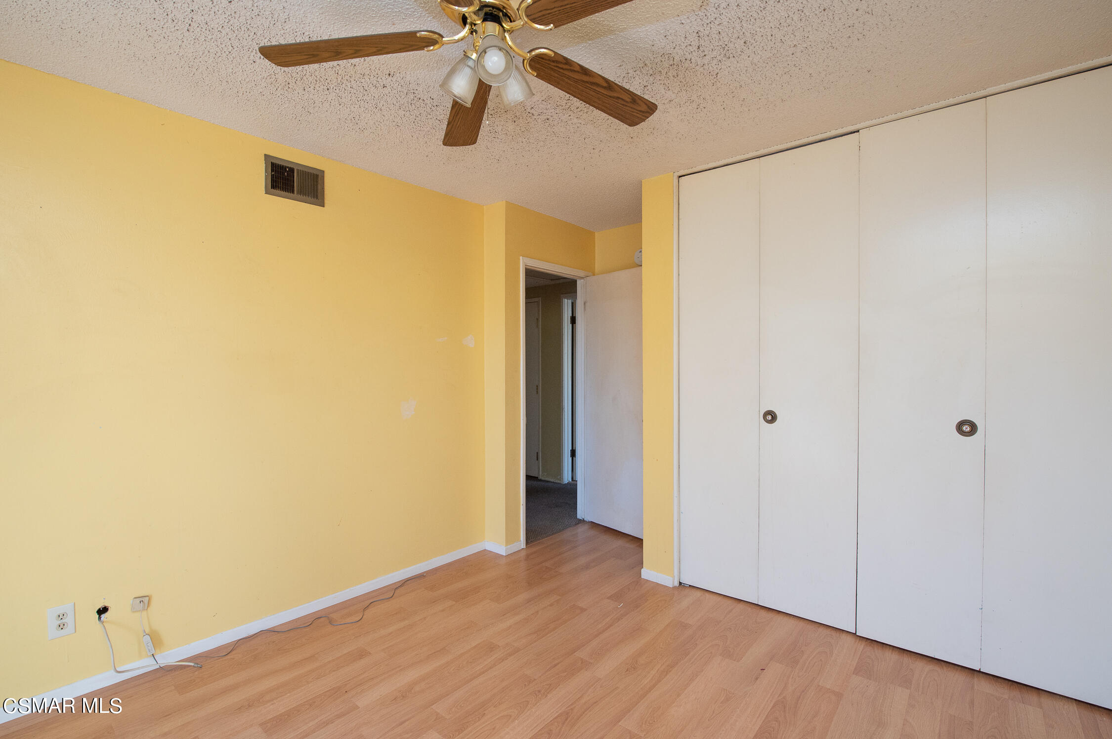 492 Graham Avenue Camarillo, CA 93010 - Photo 22 of 33 a view of an empty room with a ceiling fan