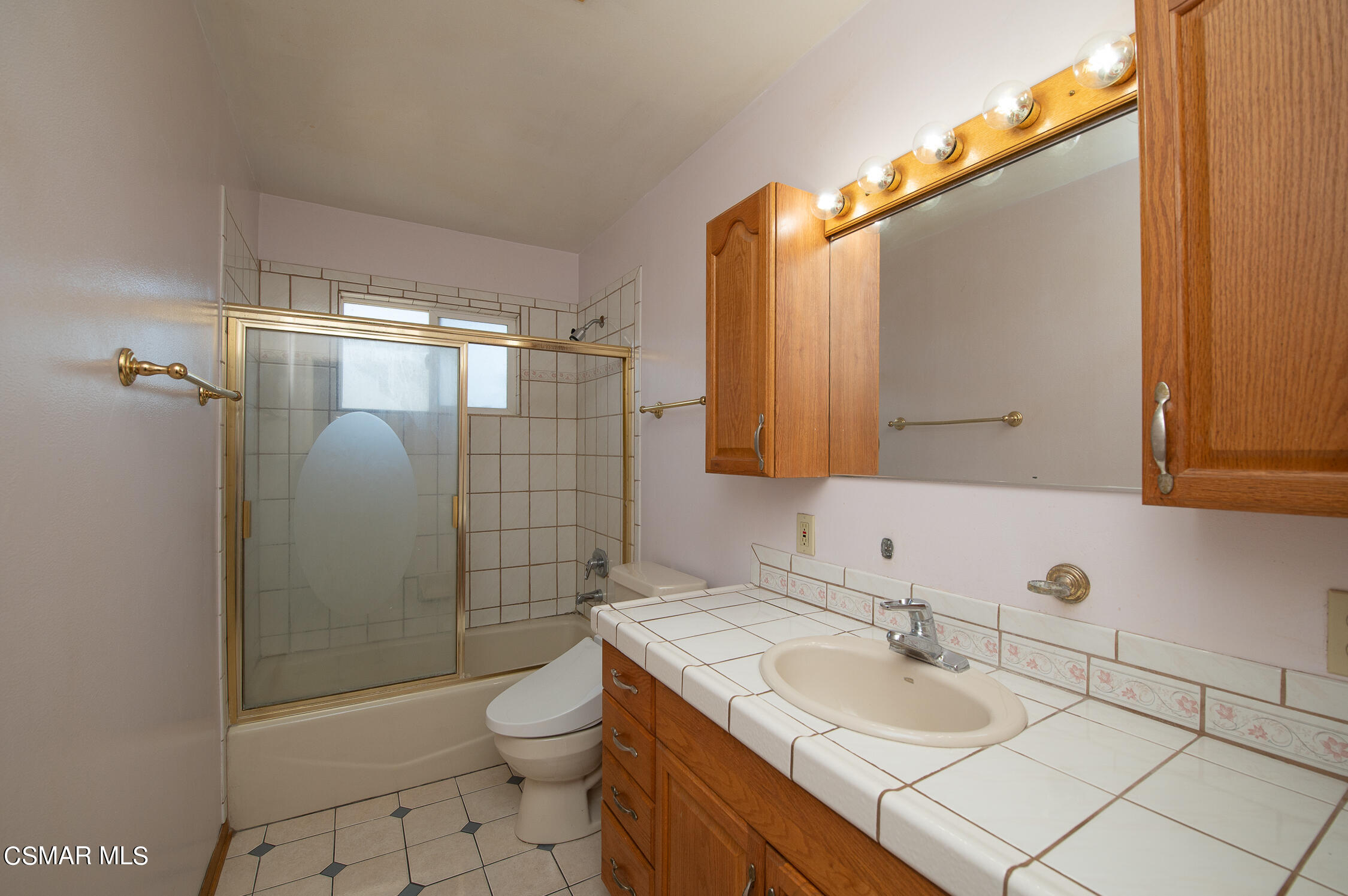 492 Graham Avenue Camarillo, CA 93010 - Photo 25 of 33 a bathroom with a granite countertop sink toilet and shower
