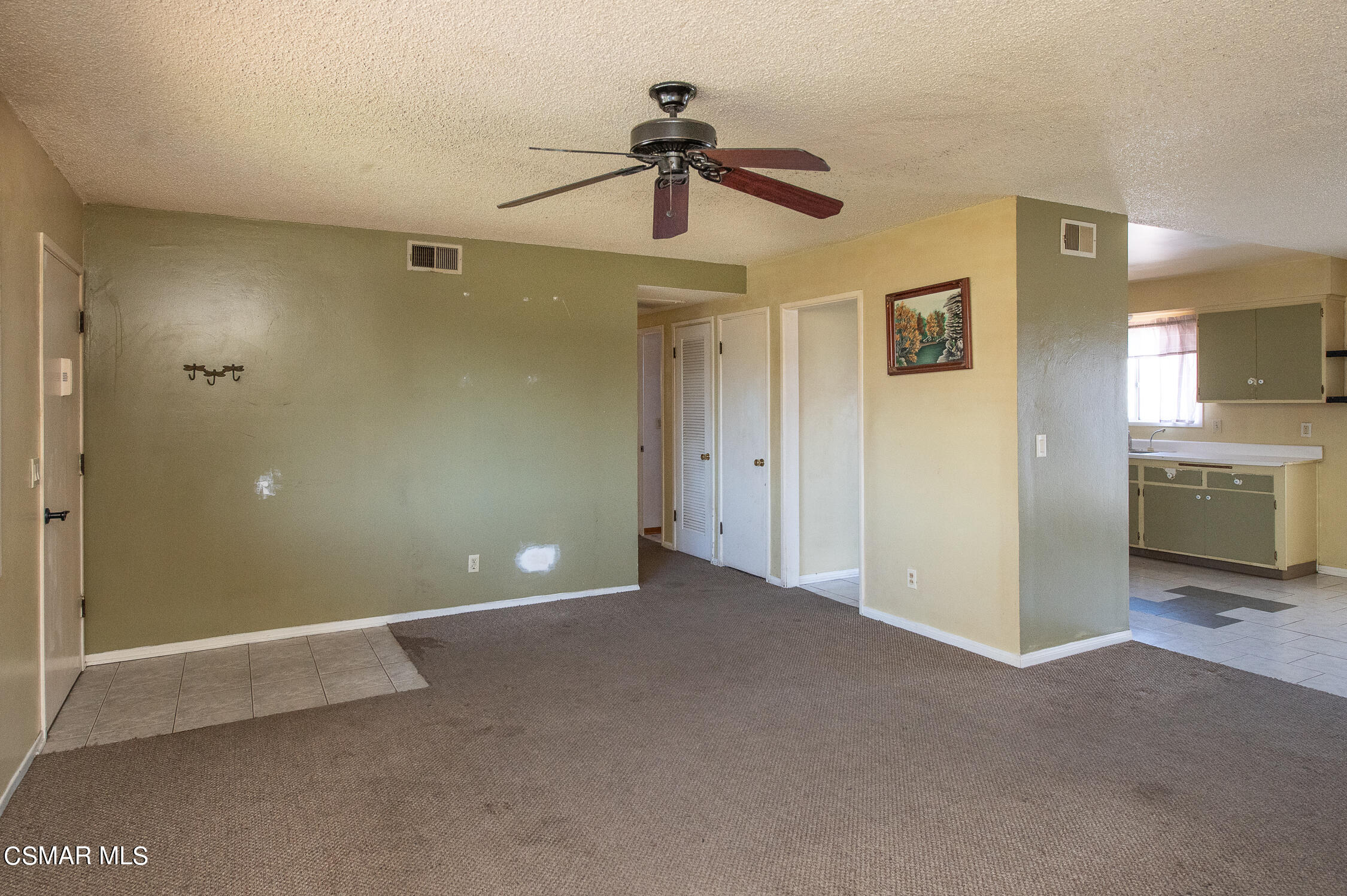 492 Graham Avenue Camarillo, CA 93010 - Photo 4 of 33 a view of a livingroom with a ceiling fan