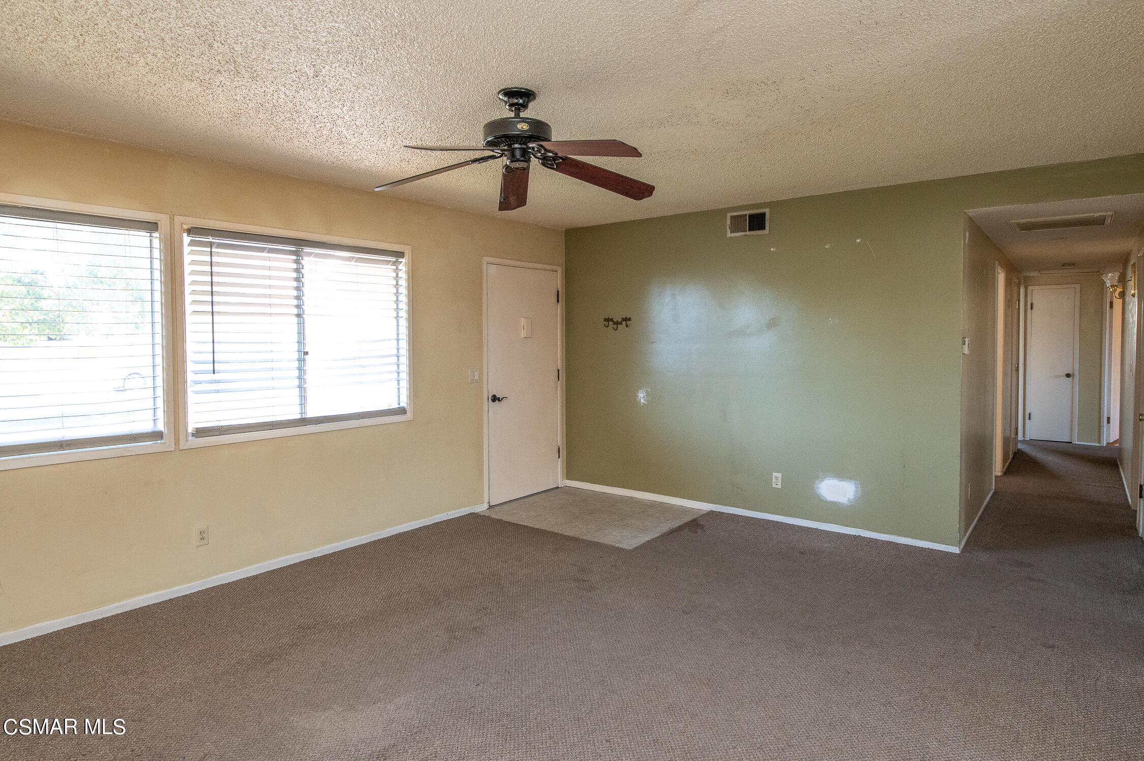 492 Graham Avenue Camarillo, CA 93010 - Photo 5 of 33 a view of an empty room with a window