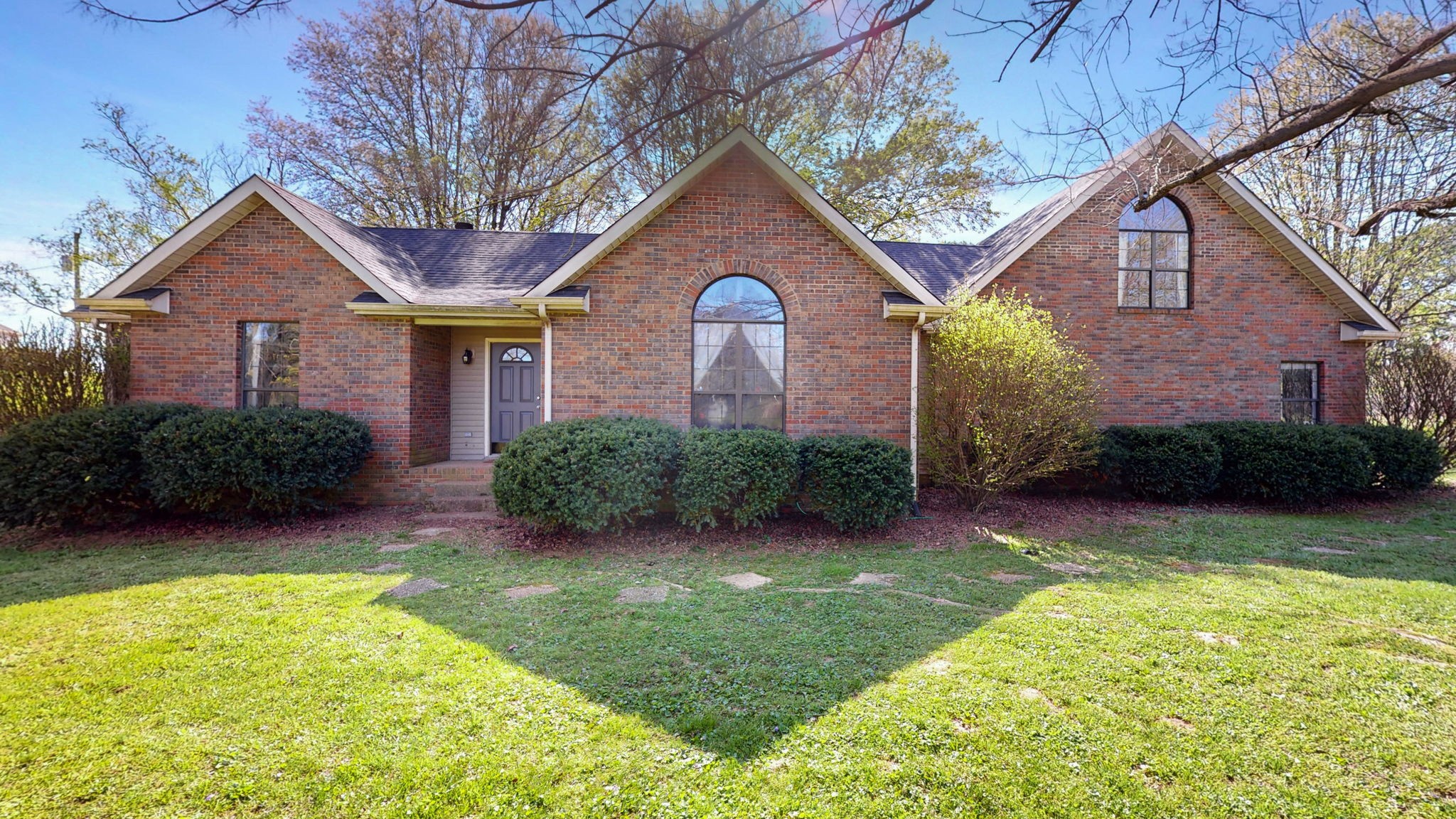 3558 Raymond Head Road Springfield, TN 37172 - Photo 1 of 50 a front view of a house with garden