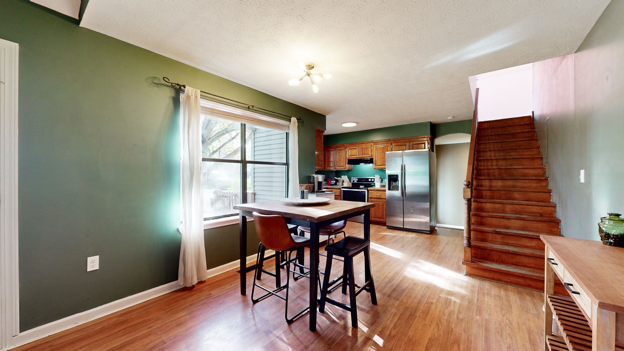3558 Raymond Head Road Springfield, TN 37172 - Photo 12 of 50 a view of a dining room with furniture window and wooden floor