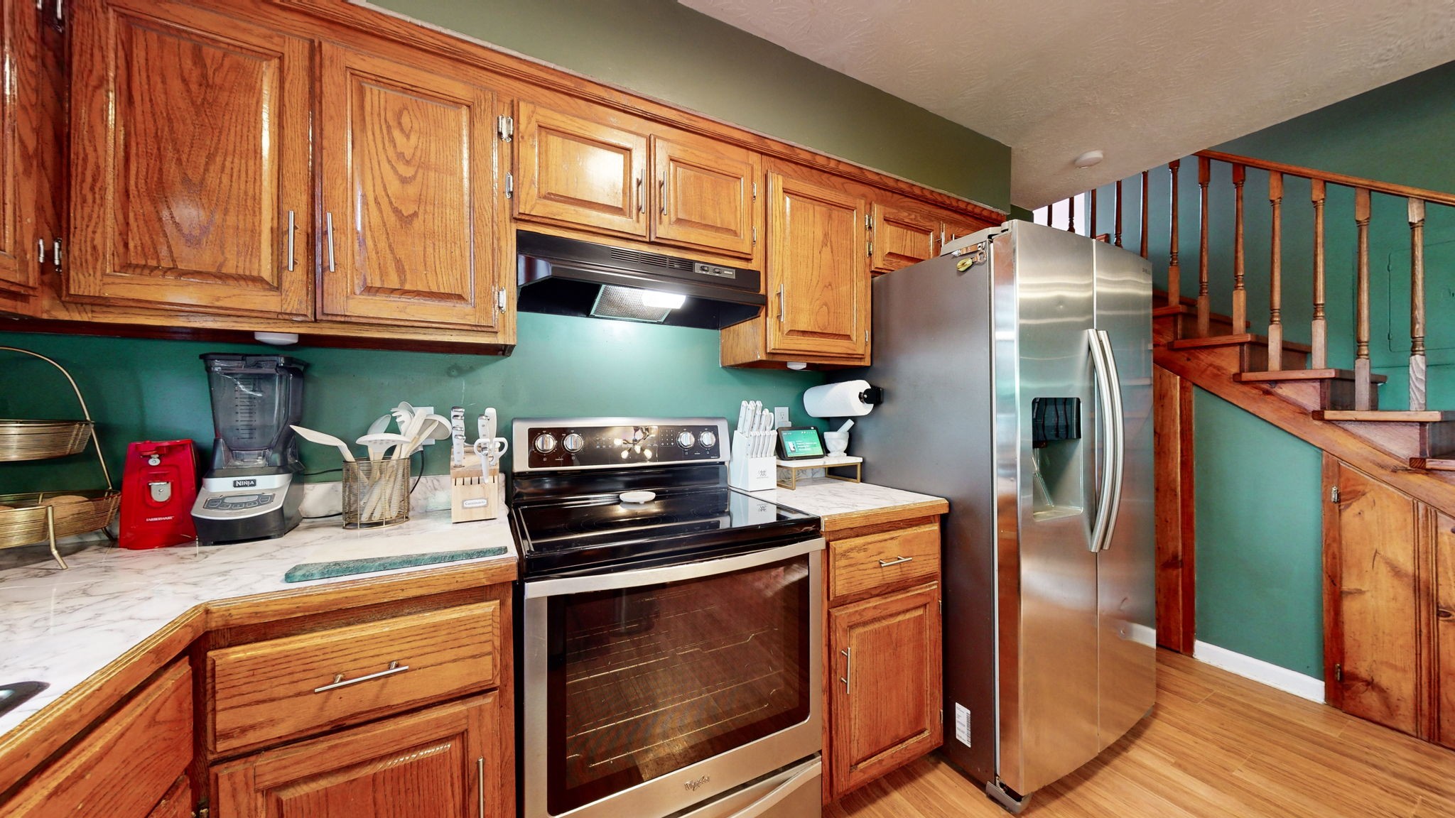 3558 Raymond Head Road Springfield, TN 37172 - Photo 16 of 50 a kitchen with stainless steel appliances granite countertop a refrigerator stove and sink