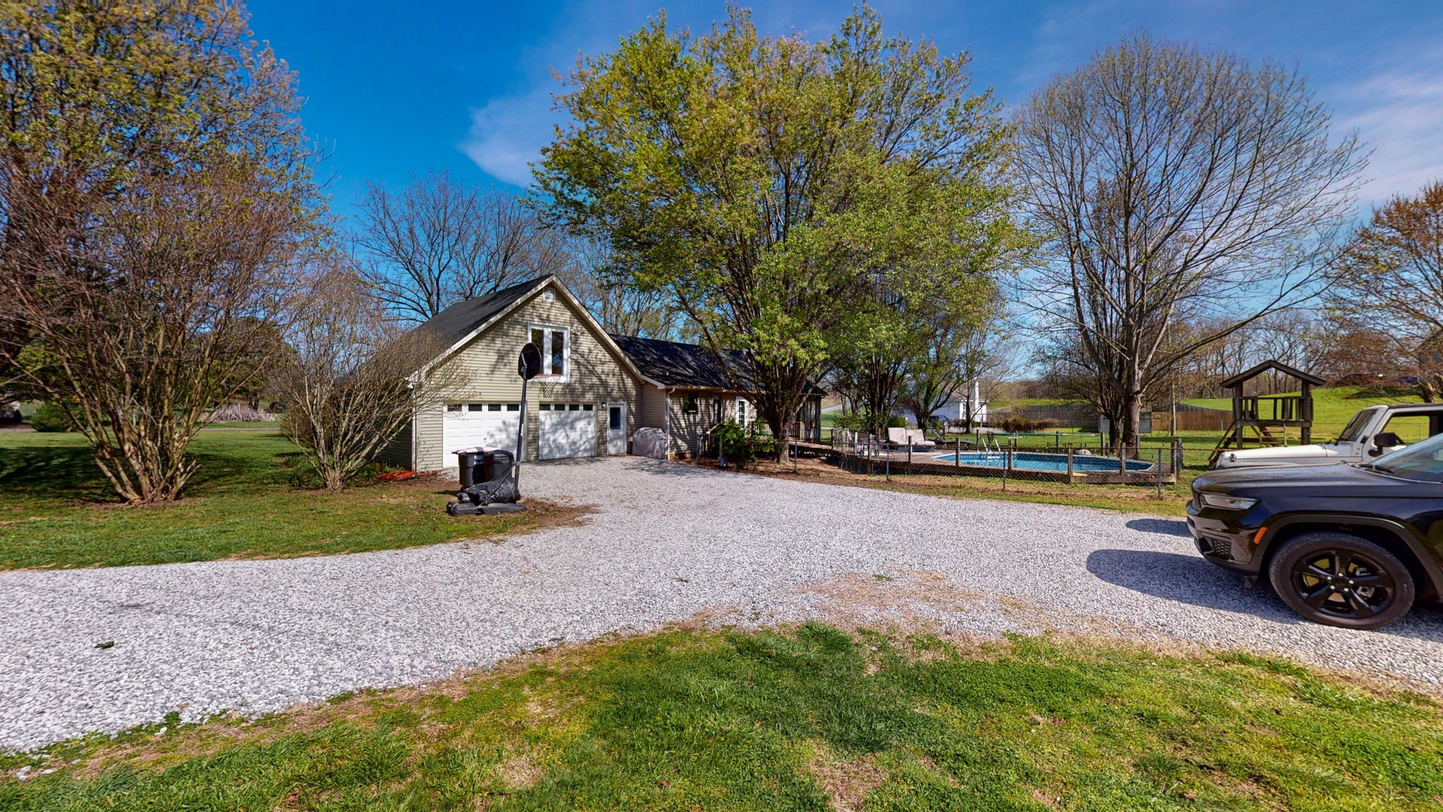 3558 Raymond Head Road Springfield, TN 37172 - Photo 38 of 50 a front view of a house with a yard and garage