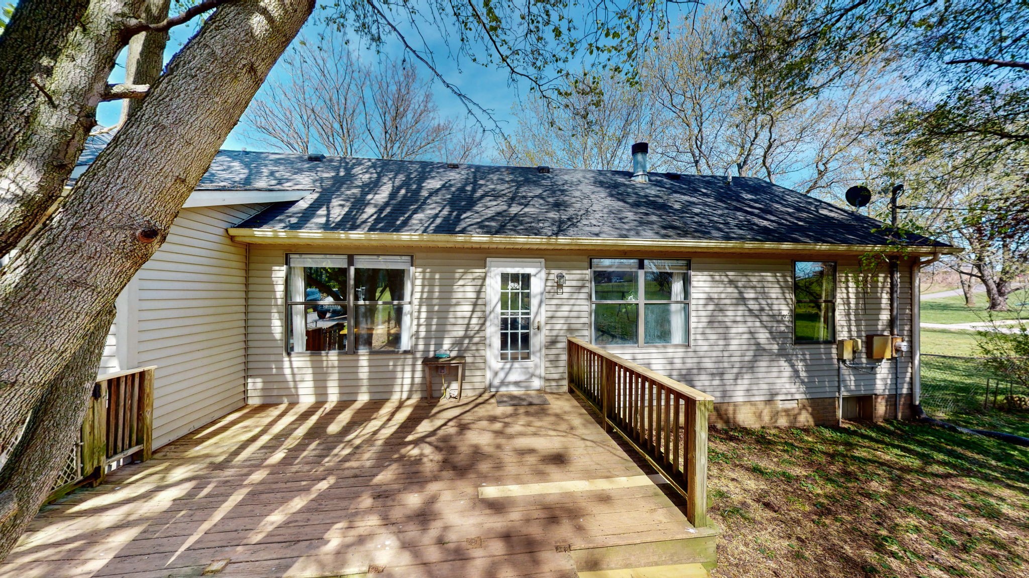 3558 Raymond Head Road Springfield, TN 37172 - Photo 41 of 50 a view of a house with a wooden deck