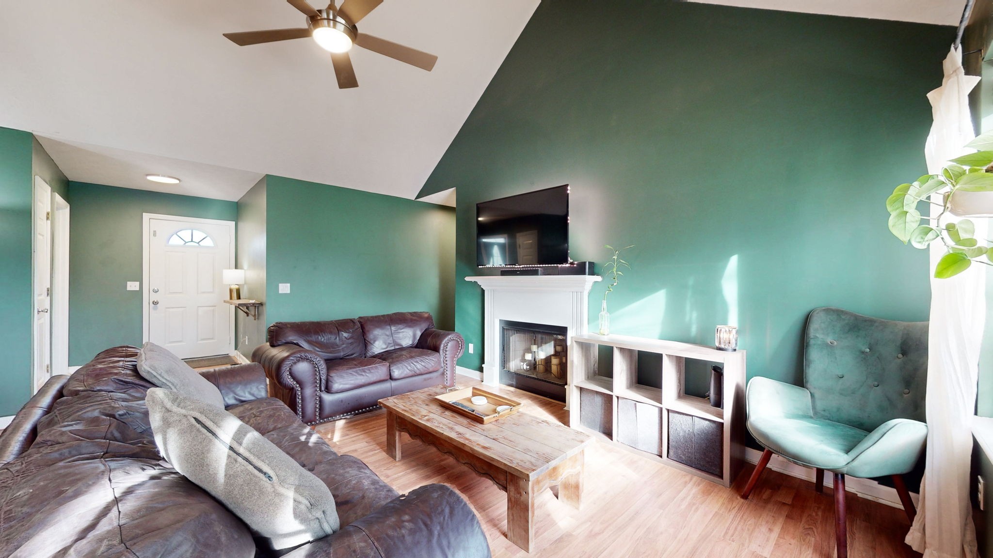3558 Raymond Head Road Springfield, TN 37172 - Photo 9 of 50 a living room with furniture a fireplace and a flat screen tv