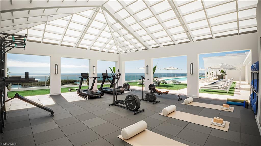 13955 Old Coast Road, Unit 1204 Naples, FL 34110 - Photo 4 of 7 a gym room with lots of tables and chairs