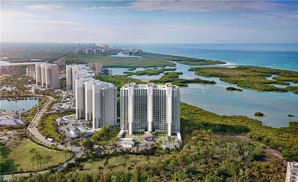 a view of a city with an ocean view