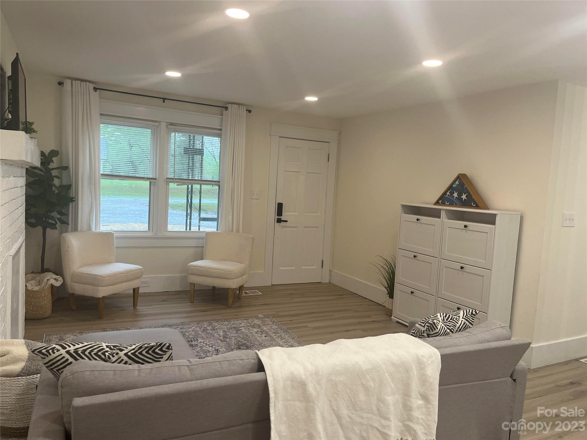 4250 Edgeland Road Edgemoor, SC 29712 - Photo 4 of 8 a spacious bathroom with a granite countertop toilet a sink and a mirror