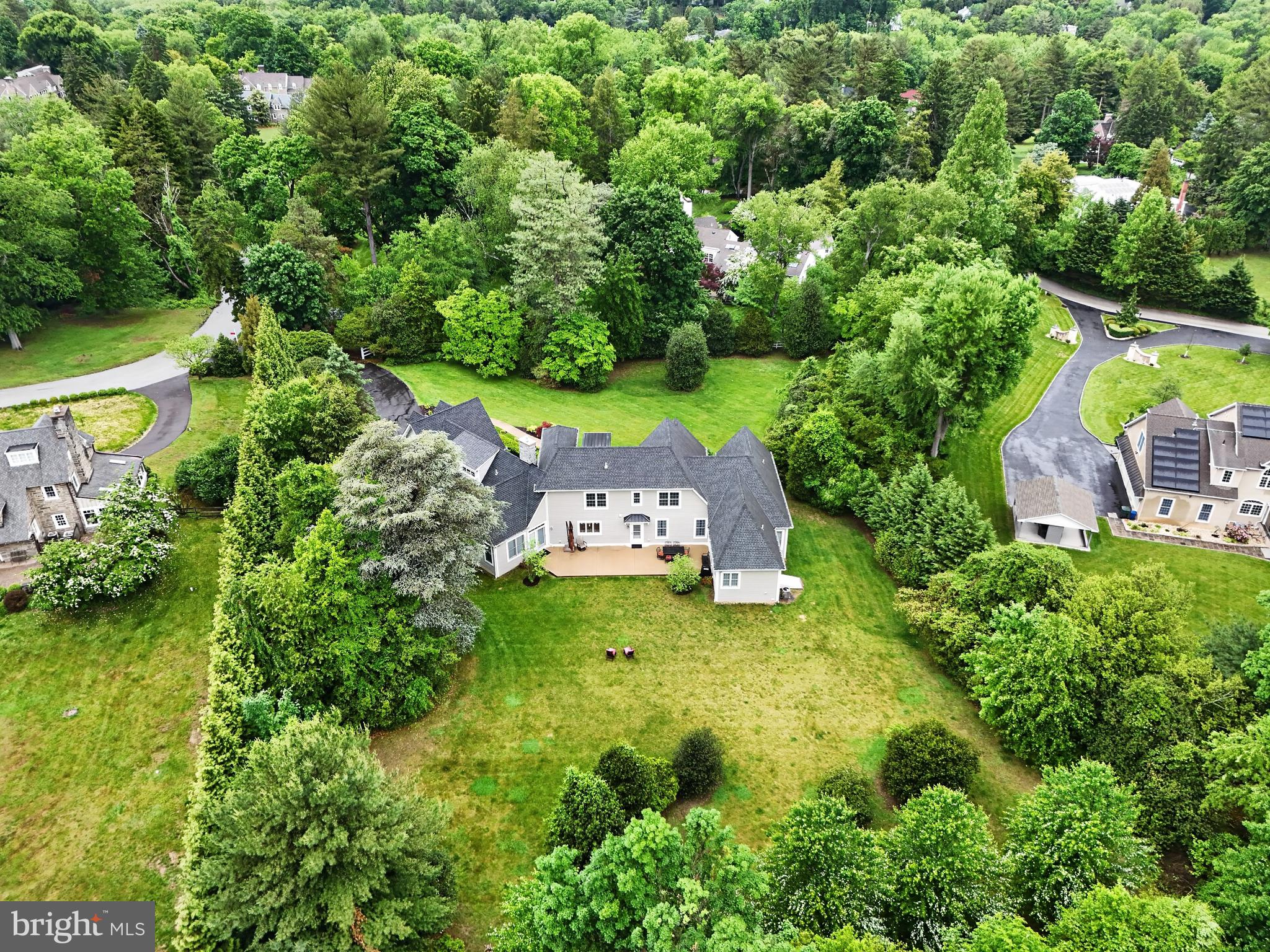 1031 Coates Road Jenkintown, PA 19046 - Photo 56 of 66 an aerial view of a house with a yard and lake view