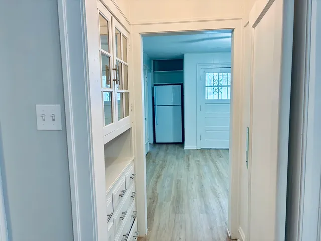 a view of livingroom with furniture and wooden floor