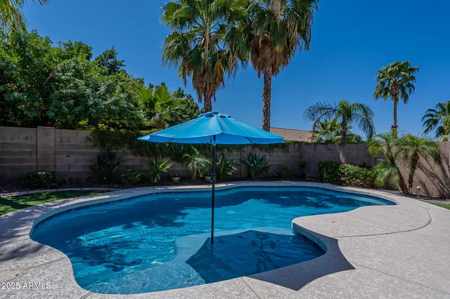 a view of a backyard with a patio