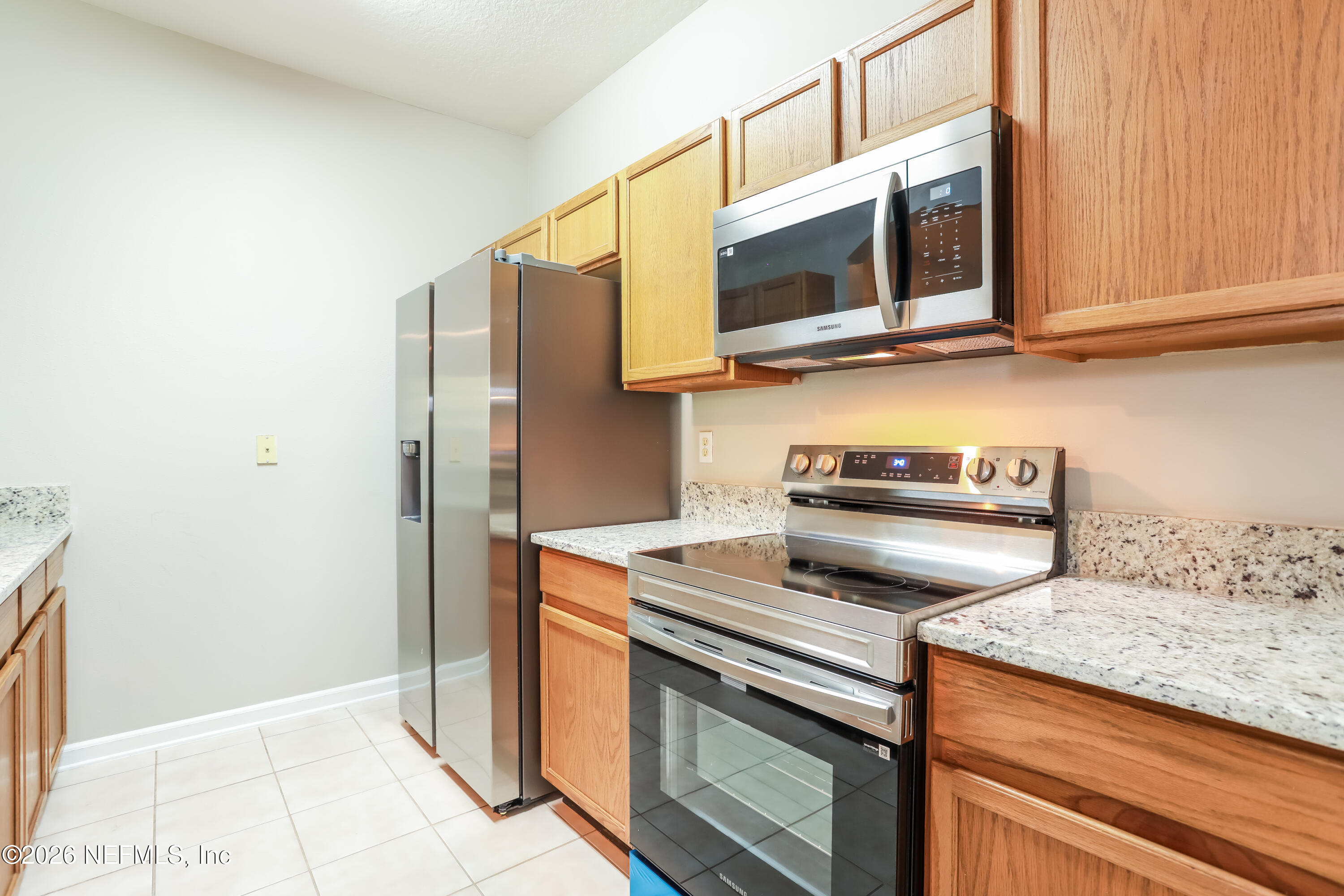 10550 Baymeadows Road, Unit 610 Jacksonville, FL 32256 - Photo 7 of 23 8-photo-Kitchen-0c8968d3-c43d-4120-bb87-