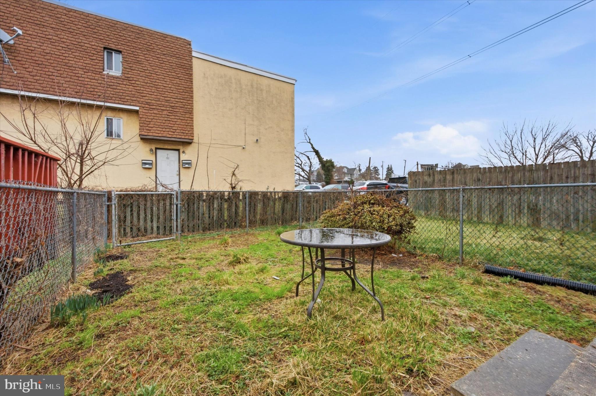 7 Rhodes Avenue Collingdale, PA 19023 - Photo 20 of 27 a view of a backyard with a garden and furniture