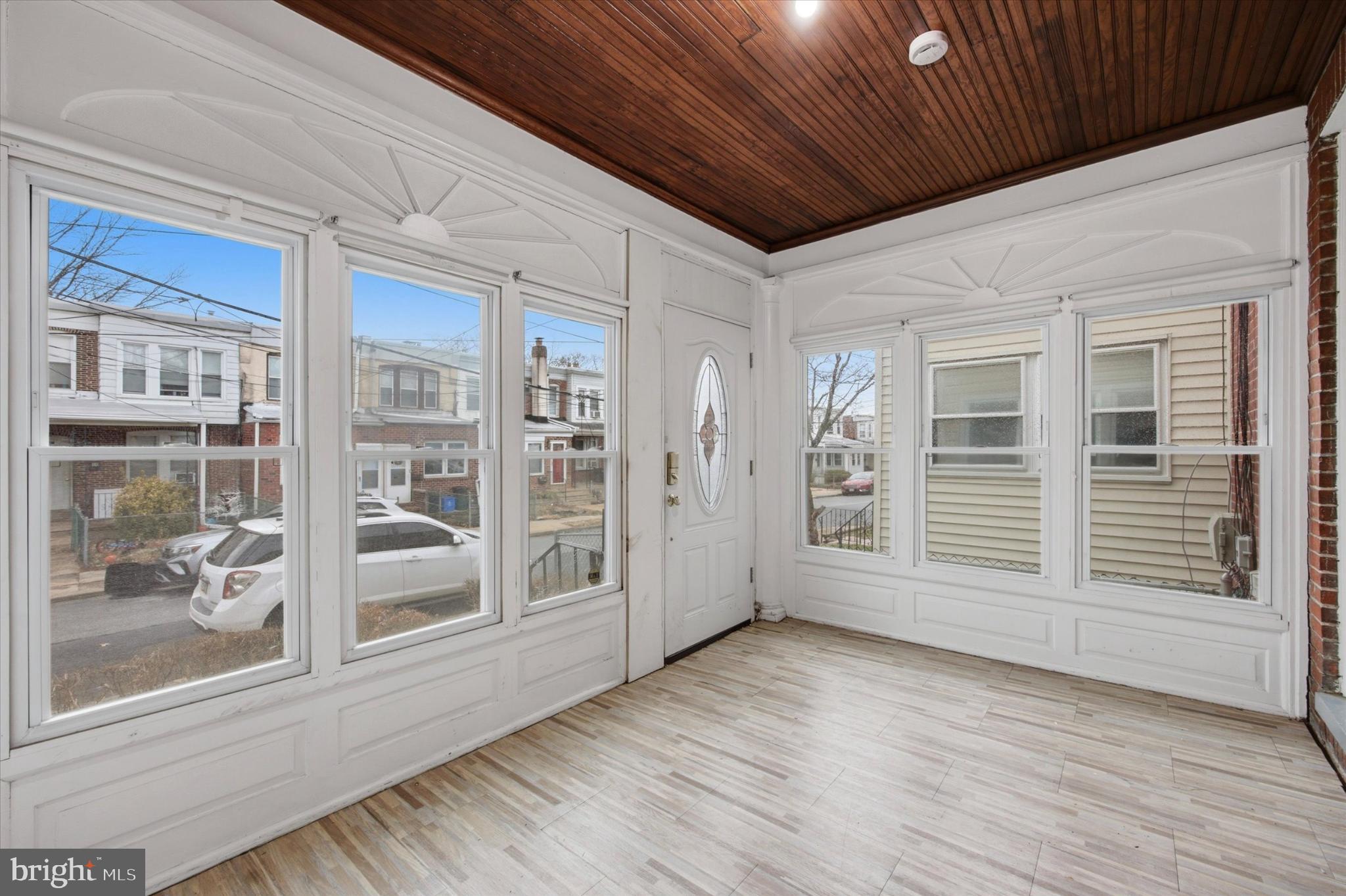 7 Rhodes Avenue Collingdale, PA 19023 - Photo 2 of 27 a view of empty room with wooden floor and fan