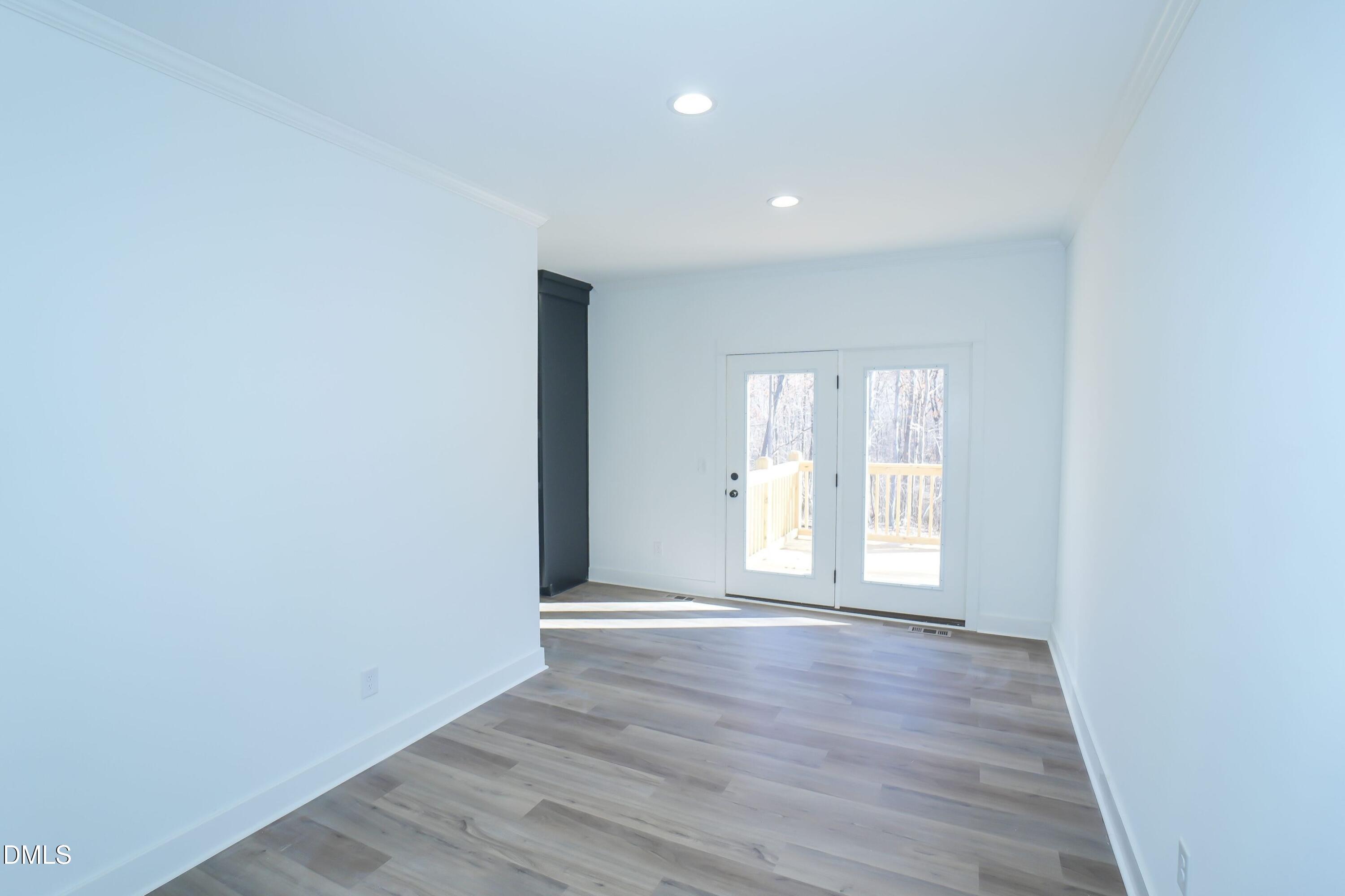 5430 Bass Mountain Road Snow Camp, NC 27349 - Photo 13 of 14 a view of an empty room with a window